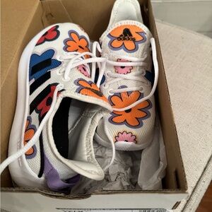 New youth Adidas tie sneakers in size 12.5 with tags.